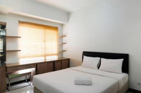 Simply Furnished Studio Apartment at Scientia Residence By Travelio